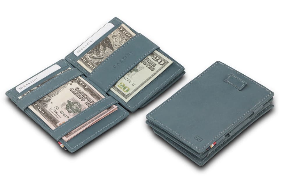 Front and open view of Cavare Magic Coin Wallet Card Sleeve in Sapphire Blue with pull tab, coin pocket, and money straps.
