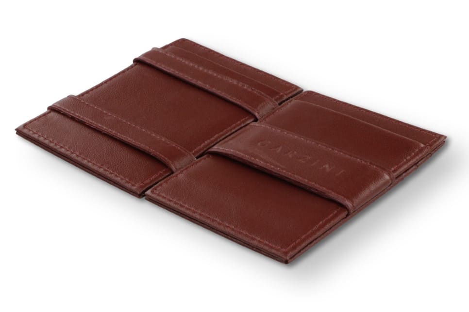 Open view of the Essenziale Magic Wallet ID Window Vegan in Cactus Burgundy with the money strap to secure money.