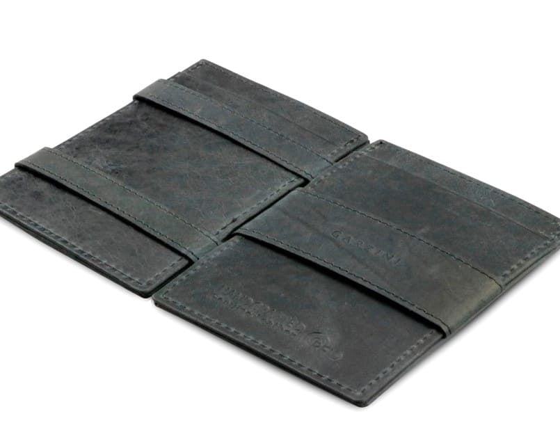 Open Cavare Magic Wallet Brushed in Brushed Black with pull tab, and money straps.