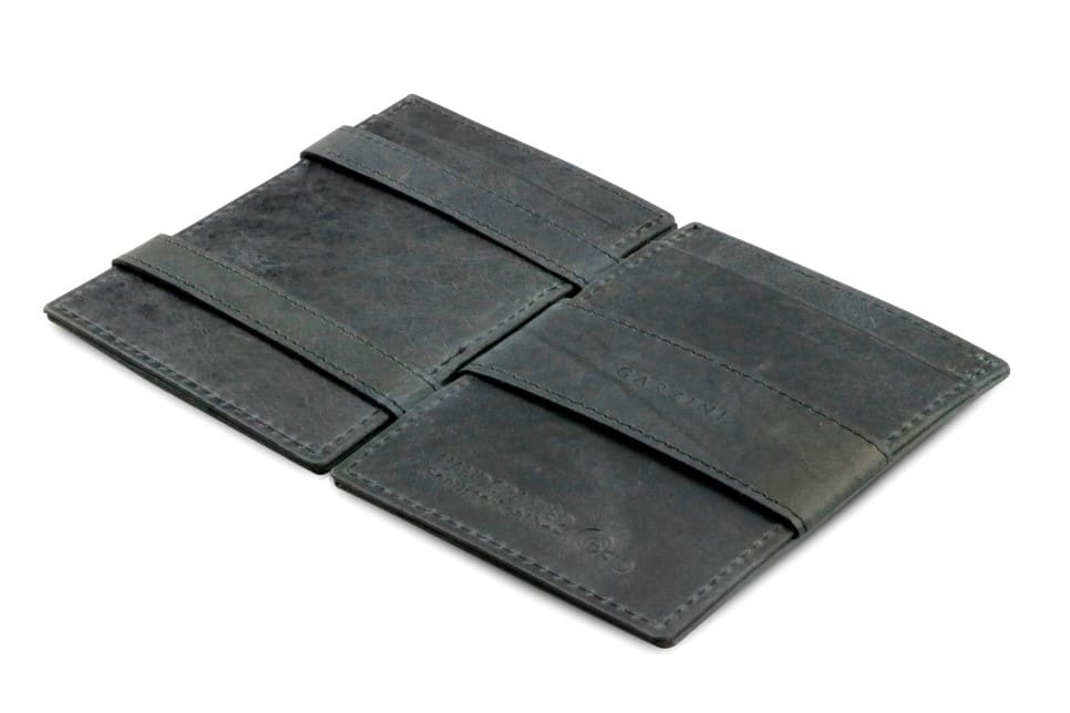 Open Cavare Magic Wallet Brushed in Brushed Black with pull tab, and money straps.