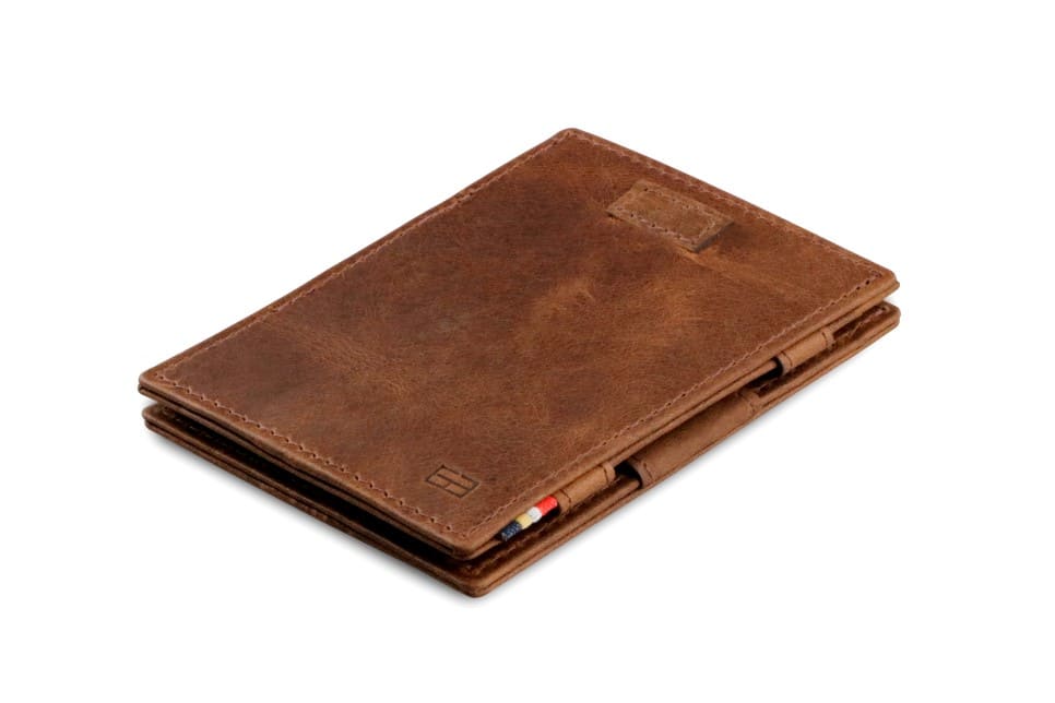 Front view of Cavare Magic Wallet Brushed in Brushed Brown with pull tab.