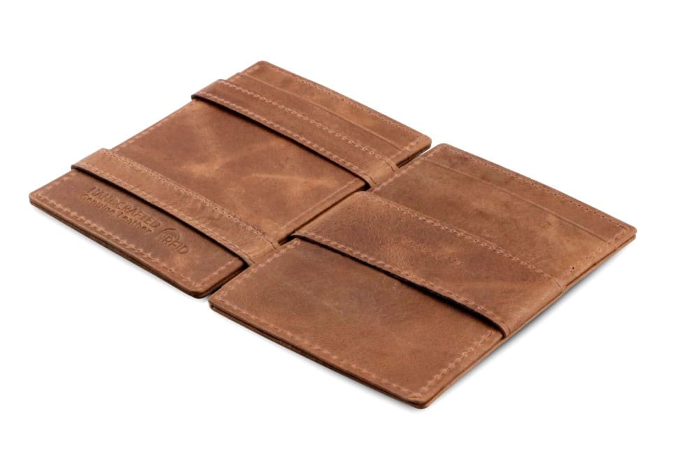 Open Cavare Magic Wallet Brushed in Brushed Brown with pull tab, and money straps.