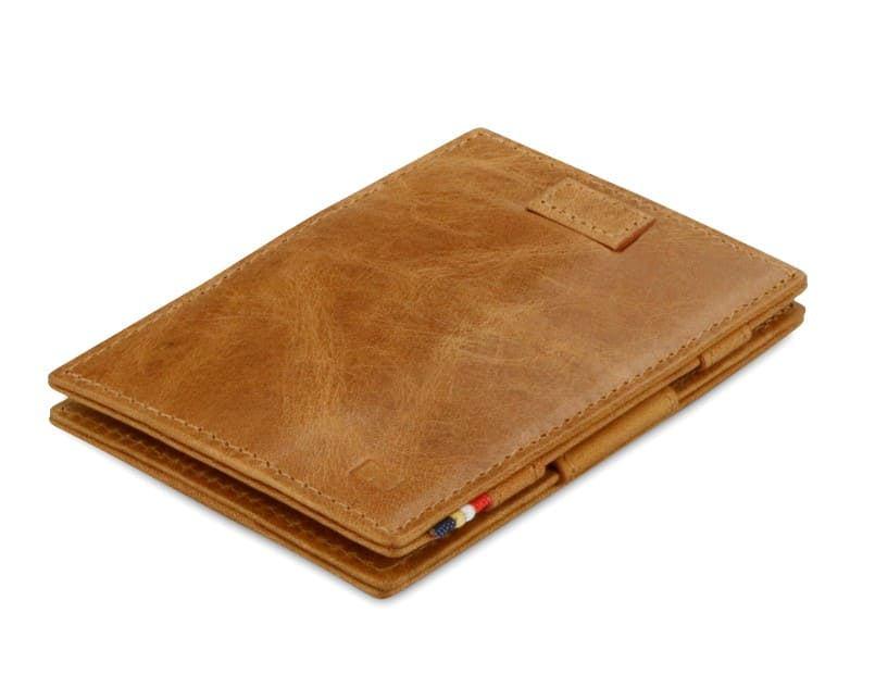 Front view of Cavare Magic Wallet Brushed in Brushed Cognac with pull tab.