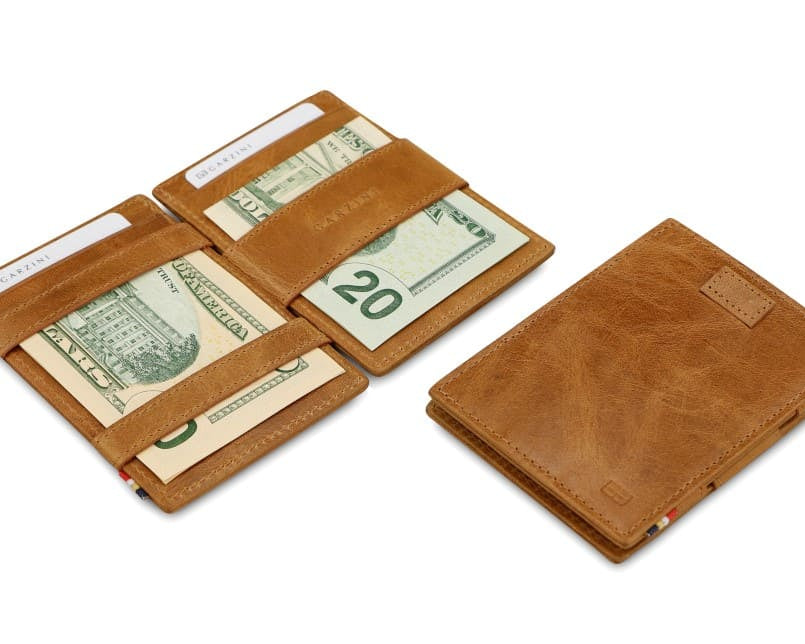 Front and open view of Cavare Magic Wallet in Brushed Cognac with pull tab, and money straps.