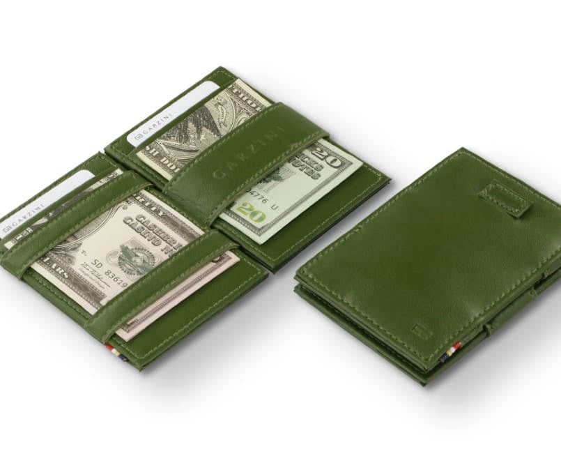 Open view of the Cavare Magic Wallet Card Sleeve Cactus in Cactus Green with money inside and 