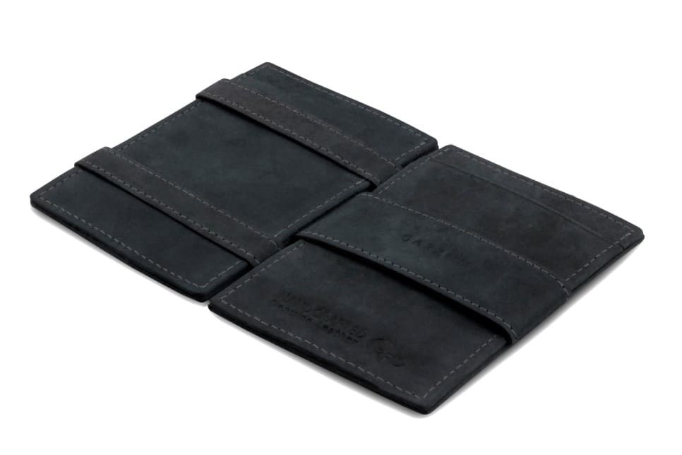 Open Cavare Magic Wallet Vintage  in Carbon Black with pull tab, and money straps.