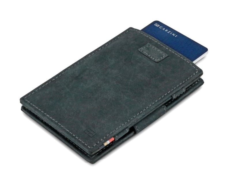 Front view of Cavare Magic Wallet Vintage in Carbon Black with pull tab and card pulling out.