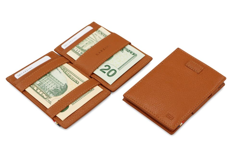 Front and open view of Cavare Magic Wallet Card Sleeve Nappa in Cognac Brown with pull tab, and money straps.