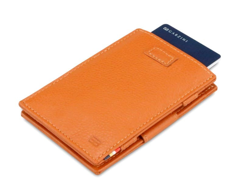 Front view of Cavare Magic Wallet Card Sleeve Nappa in Cognac Brown with pull tab and card pulling out.
