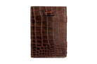 Front view of Cavare Magic Wallet Card Sleeve  in Croco Brown with pull tab.