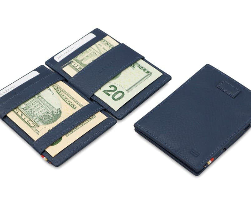 Front and open view of Cavare Magic Wallet Card Sleeve Nappa in Navy Blue with pull tab, and money straps.