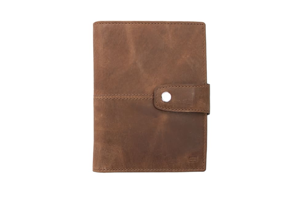 Frontview of the AirTag Passport Holder in Brushed Brushed Brown.