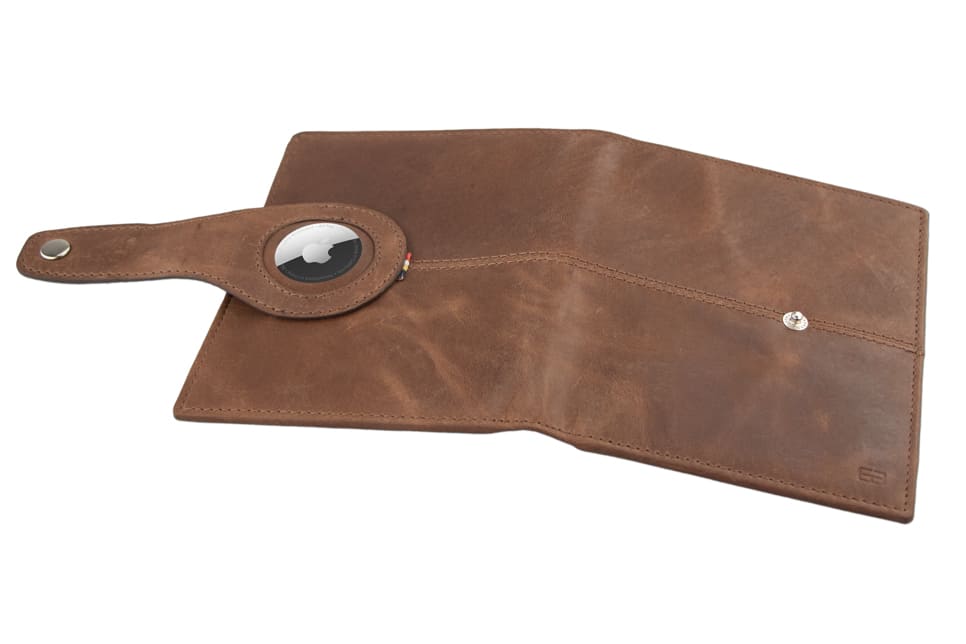 Open outside view with AirTag of the AirTag Passport Holder in Brushed Brushed Brown.