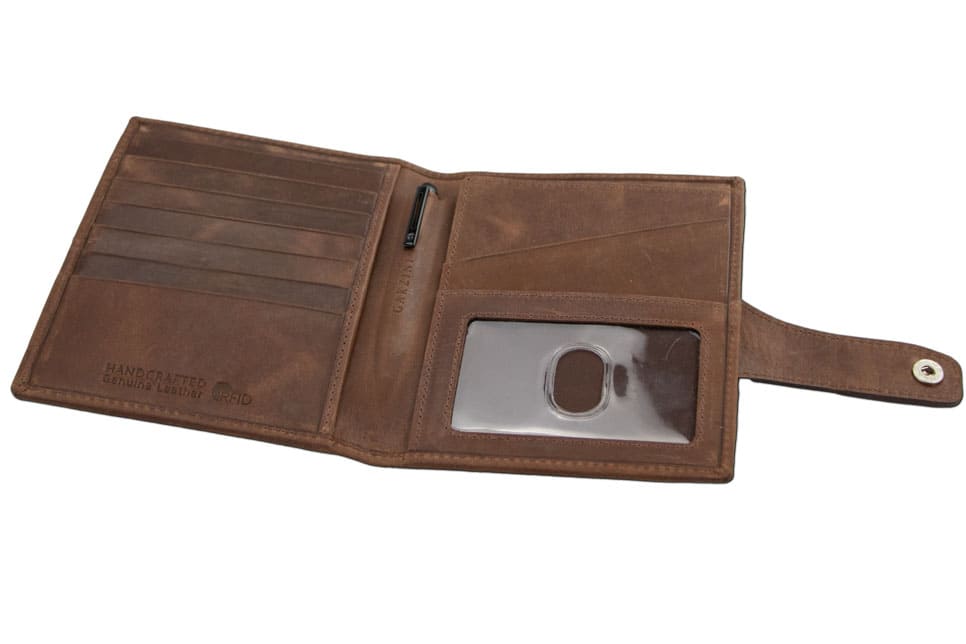 Open inside view with AirTag of the AirTag Passport Holder in Brushed Brushed Brown