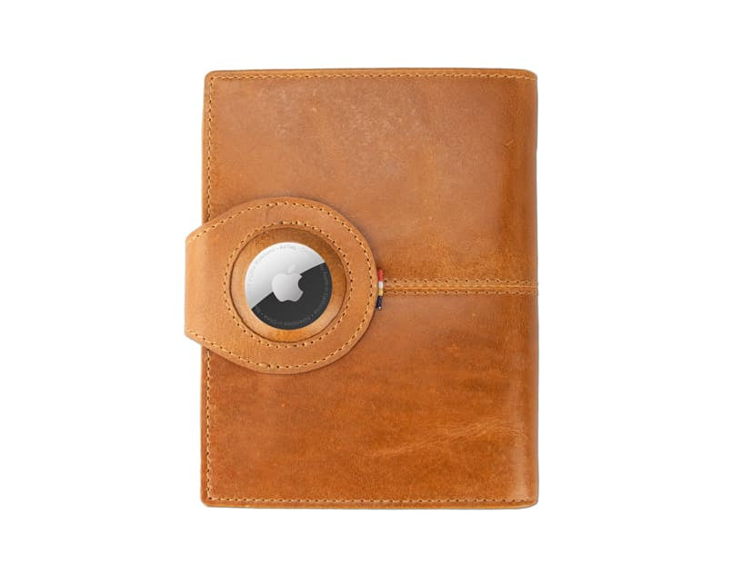 Backview with the AirTag of the AirTag Passport Holder in Brushed Brushed Cognac.