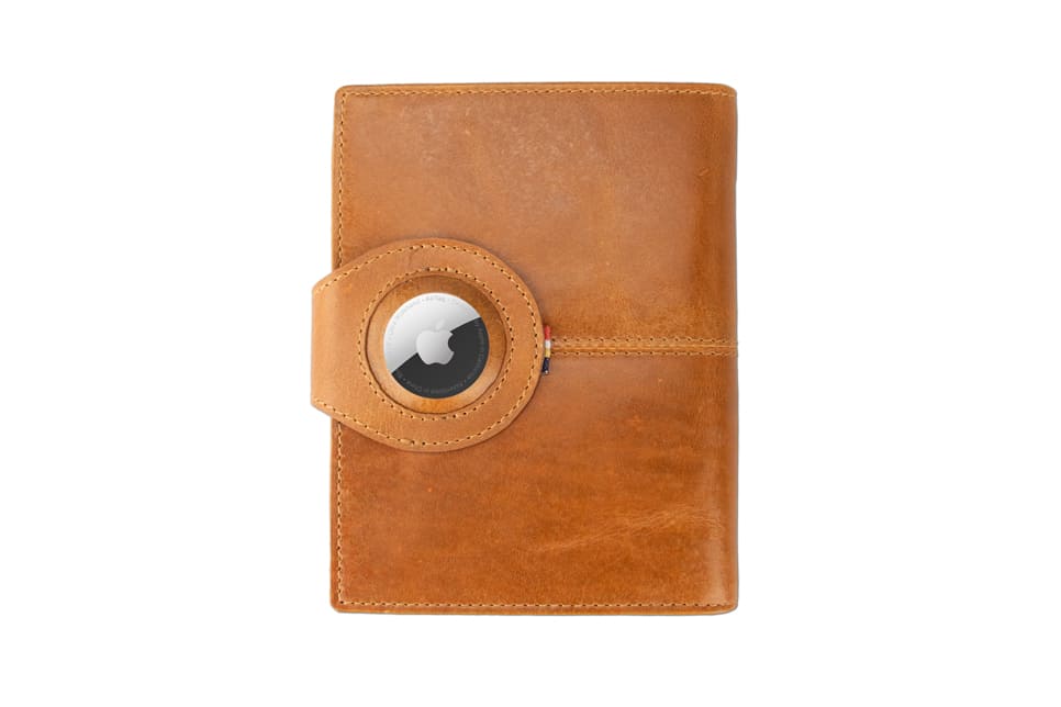 Backview with the AirTag of the AirTag Passport Holder in Brushed Brushed Cognac.