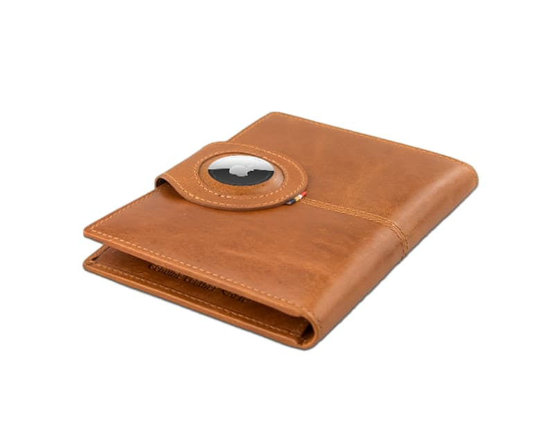 Backview sideways with AirTag of the AirTag Passport Holder in Brushed Brushed Cognac.