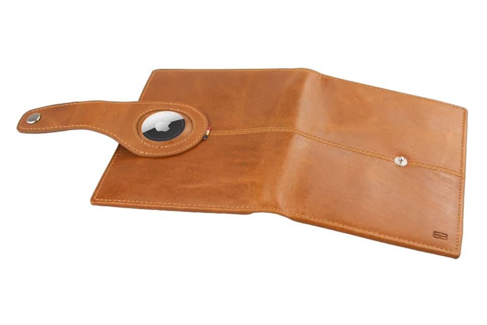 Open outside view with AirTag of the AirTag Passport Holder in Brushed Brushed Cognac.