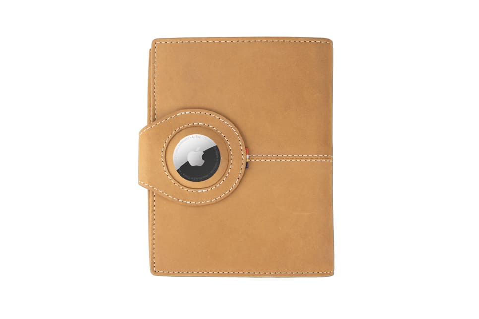 Backview with the AirTag of the AirTag Passport Holder in Vintage Camel Brown.