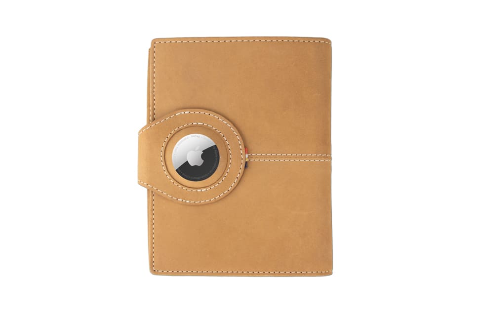 Backview with the AirTag of the AirTag Passport Holder in Vintage Camel Brown.