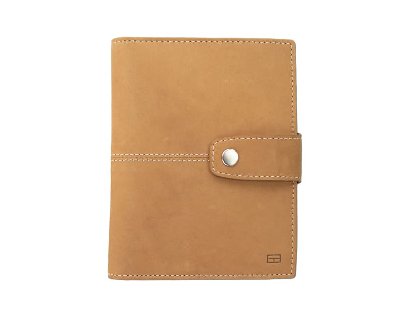 Frontview of the AirTag Passport Holder in Vintage Camel Brown.