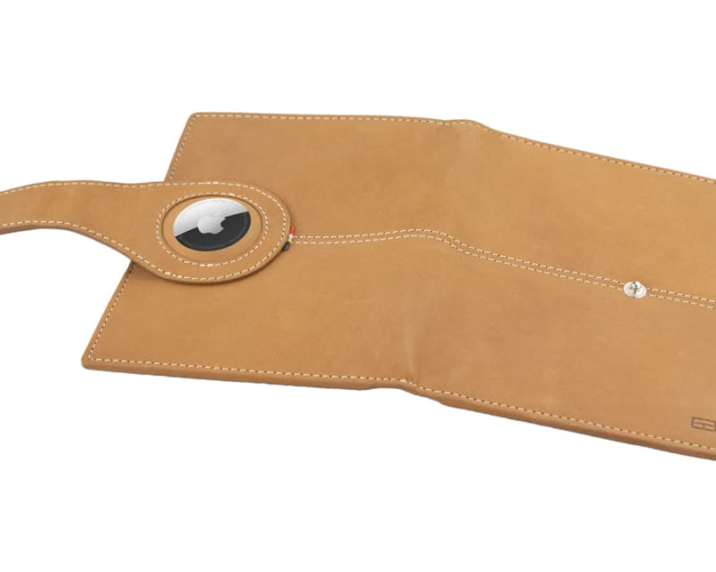 Open outside view with AirTag of the AirTag Passport Holder in Vintage Camel Brown.