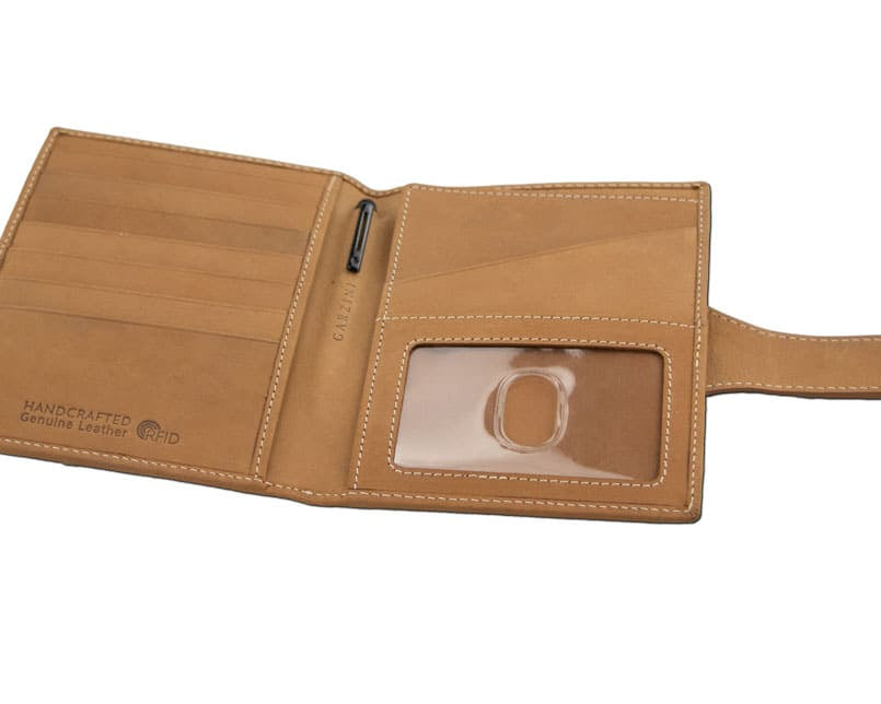 Open inside view with AirTag of the AirTag Passport Holder in Vintage Camel Brown