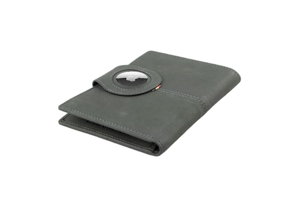 Backview sideways with AirTag of the AirTag Passport Holder in Vintage Carbon Black.