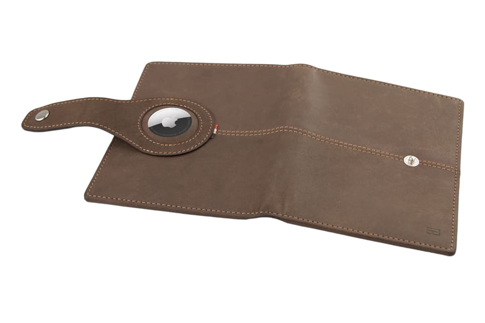 Open outside view with AirTag of the AirTag Passport Holder in Vintage Java Brown.